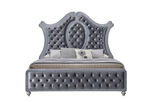  upholstered headboard is framed by an elegantly sculpted silhouette