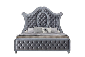  upholstered headboard is framed by an elegantly sculpted silhouette