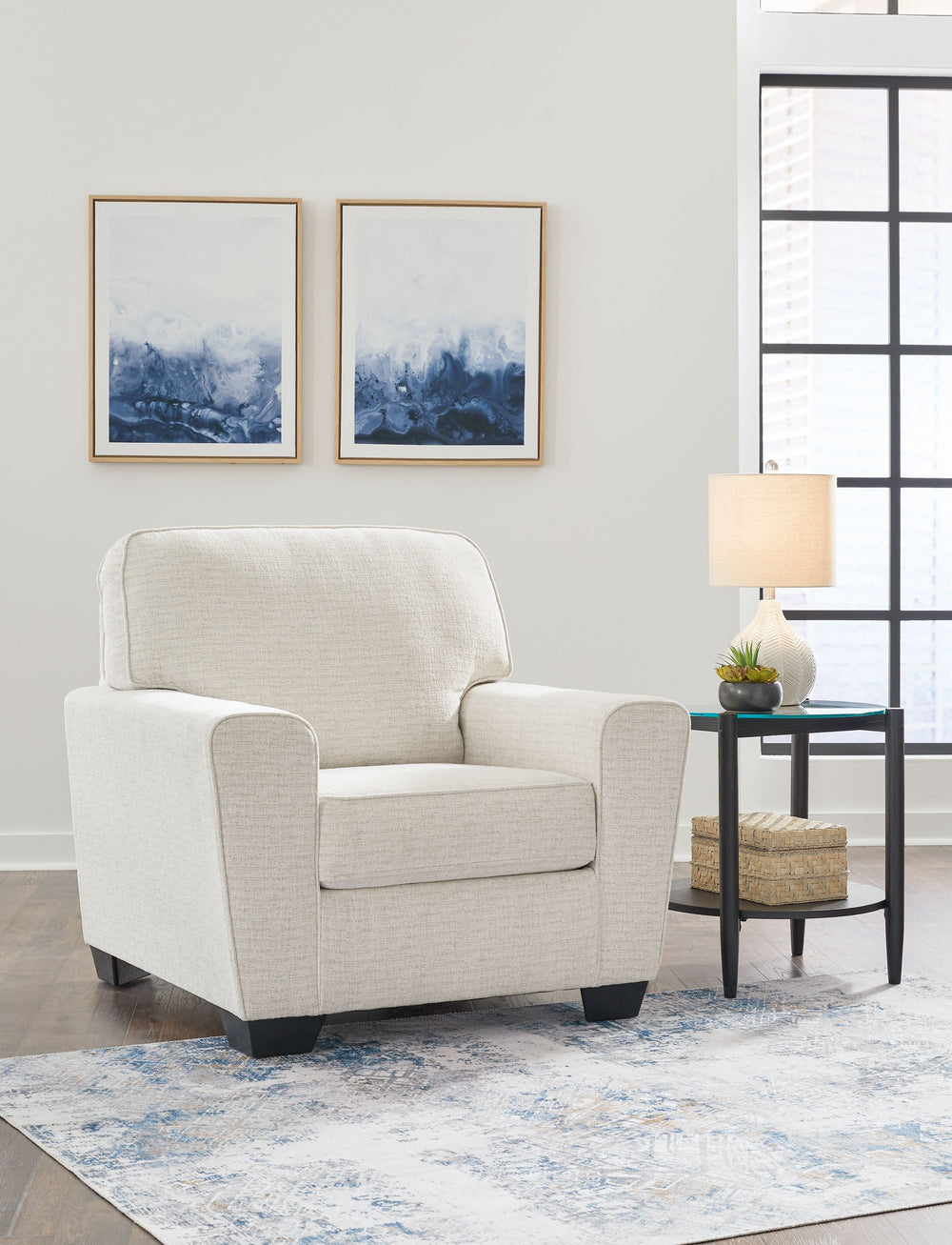Need a simple style refresh? Liven up your living room essentials with this chair. A chunky silhouette holds invitingly ample cushioning you-'ll long to lounge in. Crosshatched upholstery gives the otherwise casual design a delightful visual texture that-