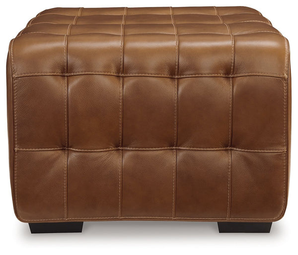  this ottoman is generously adaptable. Its combination of skillfully matched leather and faux leather upholstery exudes luxury and elegance. The cushion-'s dramatic tufting beckons you to kick back and relax.