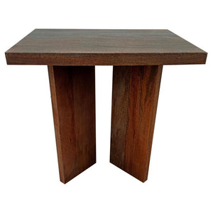 In the embrace of unadorned beauty, this end table stands with a rustic charm that echoes the soul of the wilderness. Solid mango wood, crafted from large and enduring planks, brings a touch of the untamed forest into the home. Its raw and robust design h