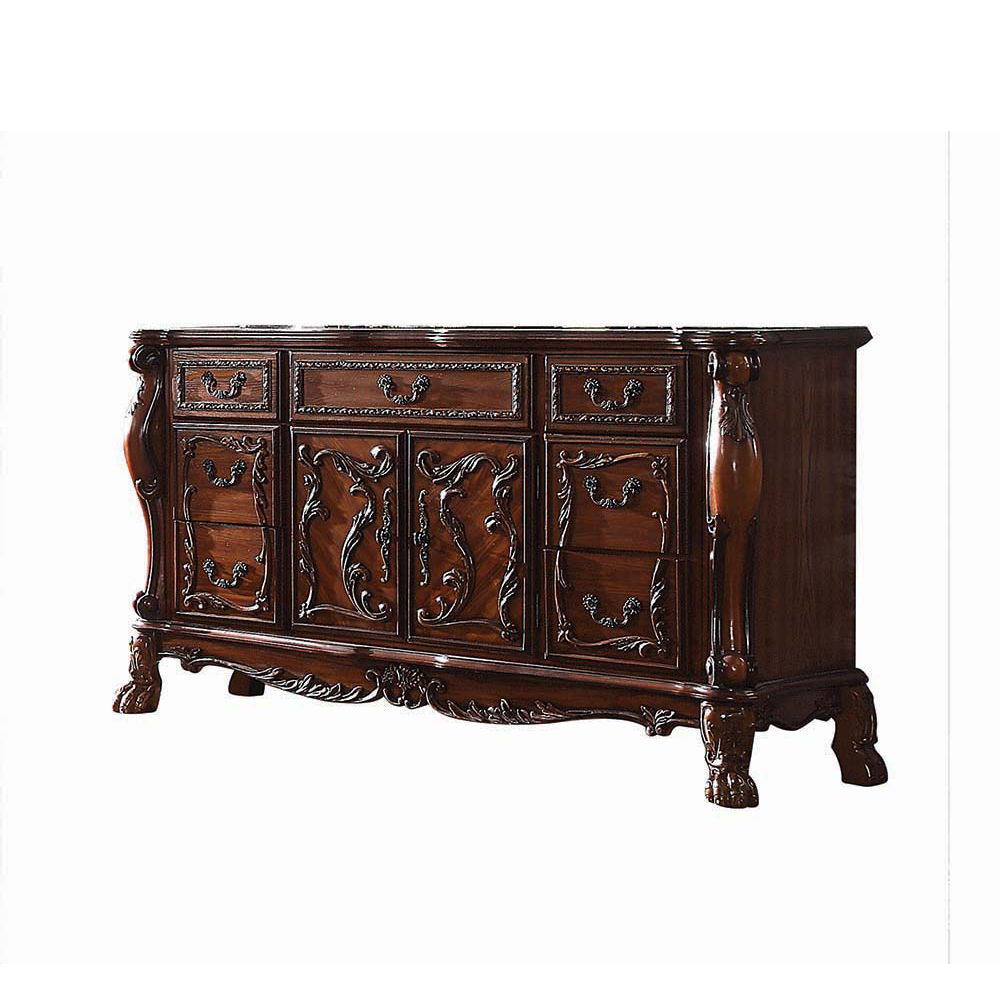 The Dresden Dresser/Server is crafted with the finest solid woods with veneers in cherry oak finish. Dresden Collection is enhanced by remarkable marquetry and generously carved wood elements. The case goods feature solid hardwood with five drawers and tw