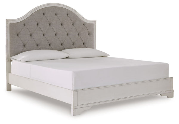 Traditional design. Casual appeal. You can have it all with this king upholstered panel bed. A relaxed chipped white finish and an inset headboard cushion with classic button tufting give the distinctive piece an allure all its own. And the low-profile si