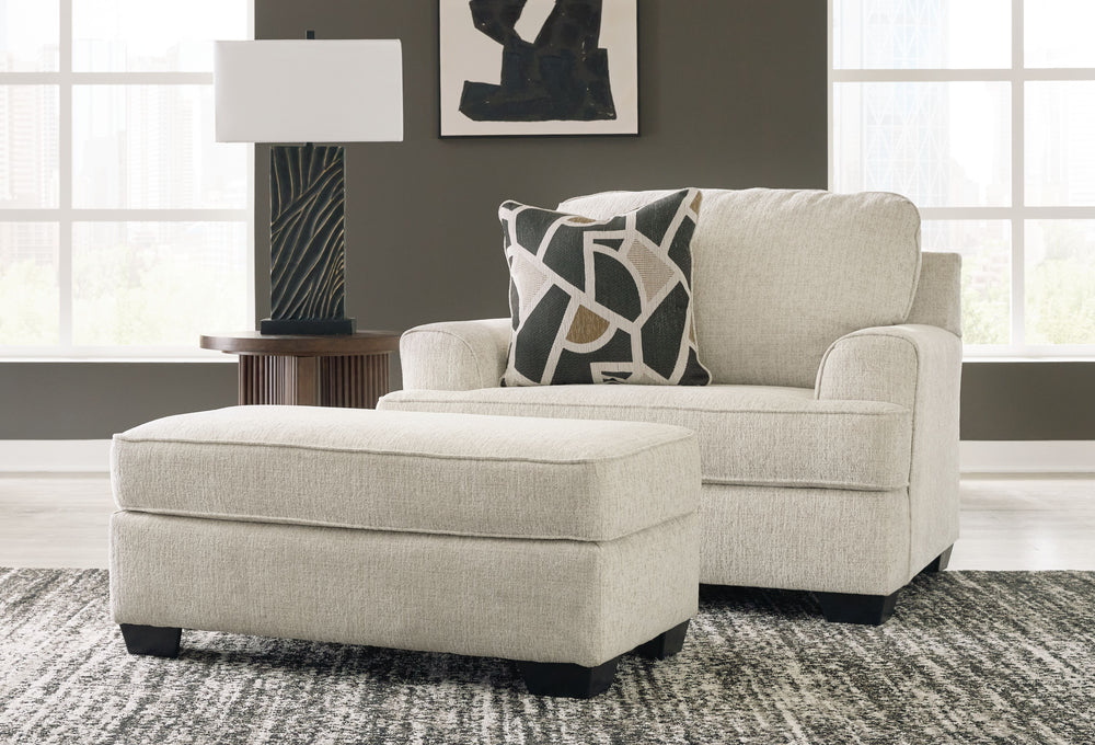 Embrace effortless elegance with this oversized chair and ottoman set. Its clean lines and curved details are right at home in contemporary settings. Stressed about styling? The neutral hue easily pairs with your existing color palette. From morning coffe