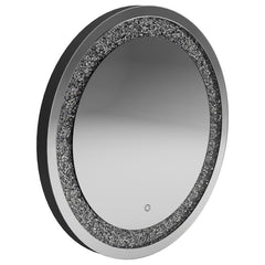 Add a glamorous glow to your space with this round LED wall mirror. Surrounded by a dazzling silver frame with embedded crystal-like accents, it blends modern style with everyday function. The integrated LED lighting provides soft illumination, making it 