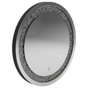 Add a glamorous glow to your space with this round LED wall mirror. Surrounded by a dazzling silver frame with embedded crystal-like accents, it blends modern style with everyday function. The integrated LED lighting provides soft illumination, making it 