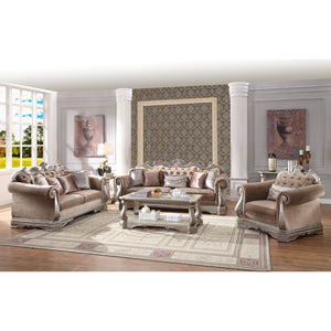 The Northville sofa is exclusively designed and filled with romantic spirit. This beautiful velvet upholstered sofa features carved legs, apron, and trim, decorated with raised and scrolled floral motifs in an antique silver finish. This sophisticated sof