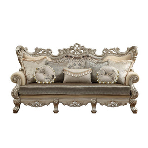 With luxurious styling and comfort with pocket coil seat cushions, the Ranita sofa is grand in looks and feel, with a high wrap around back with oversized carved back detail. This attention to detail in the solid wood ornate and pierced carving surrounds 