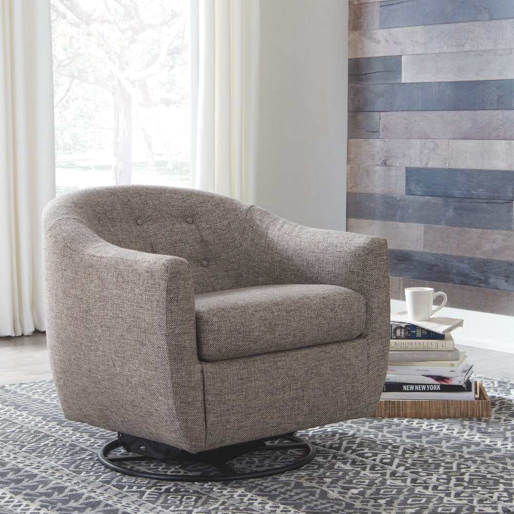 Take a turn for the better with this upscale swivel glider accent chair. Upholstered in a richly woven taupe fabric, this contemporary beauty with tufted barrel back provides a smooth 360-degree swivel thatâ€™s such a nice twist.<br><br><b>Additional Dime