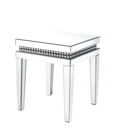 Shining in the Hollywood glamour style, the Lotus End Table will be an ultimate statement piece for your dreamy living room. This mirrored furniture features reflective surface for a multi-layered look, with decorative faux crystals enhancing its modern a
