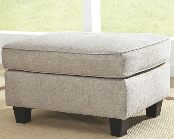  this ottoman impresses with a tailored silhouette. Designed in a warm neutral color perfect in any contemporary home. One look at this sumptuous ottoman