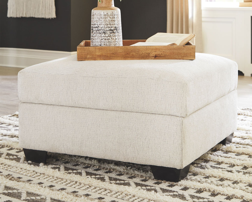 Let it snow. Doubling your pleasure with its combination of form and function, this storage ottoman in a snow-tone chenille fabric invites you to stretch your style in an easy-elegant way. Whether your aesthetic is urban hip or suburban chic, this posh ot
