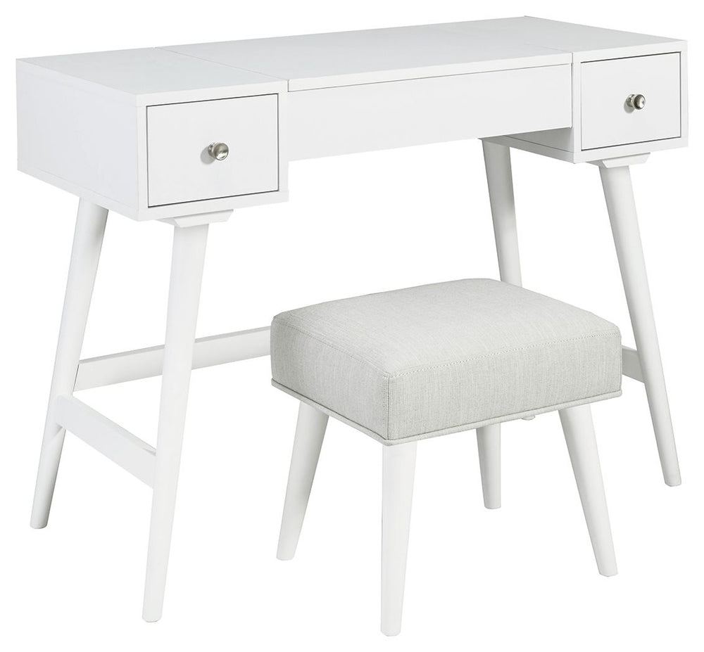 Whether in a teenâ€™s room, master bedroom or dressing area, the mid-century inspired design of this vanity set in white is packed with possibilities. The flip-top design makes it doubly handy as a vanity or writing table