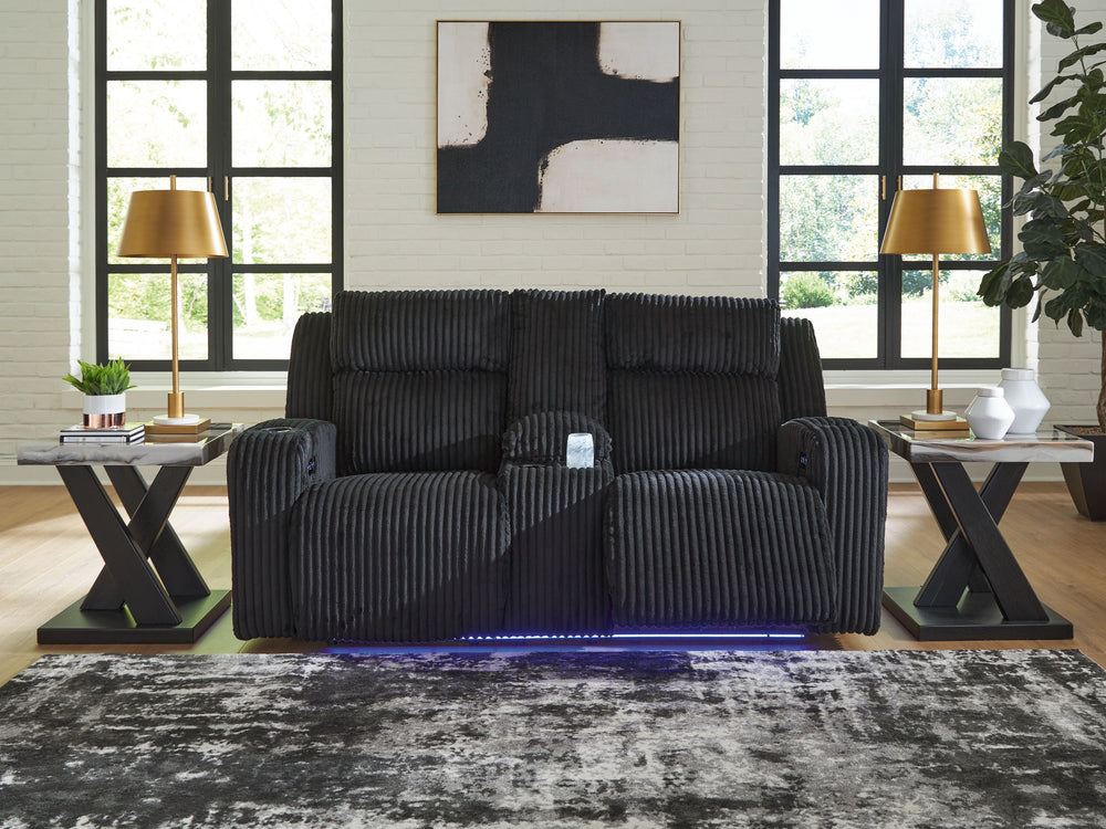 Trend-right style, meet irresistible modern function. Your living room gets a cozy-cool upgrade with the TwinBrooke power reclining loveseat. Curl up in its ultra-chic corded upholstery and recline with one-touch controls. Is it movie night or game time? 