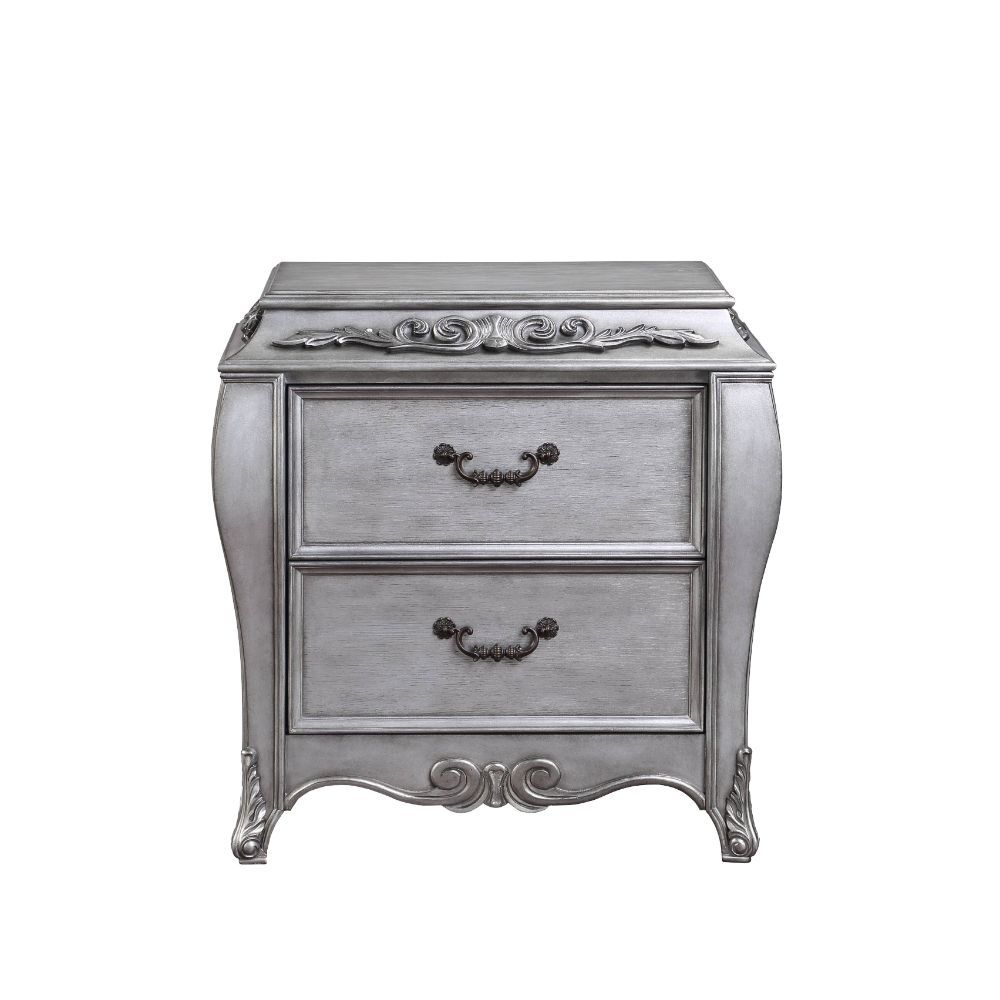 2 Drw Case-Leg Wooden Frame with Raised Scrolled-Floral Motifs Wooden Cabriole Leg Shape: Rectangular (Bowed)<br/><br/><b>Product Features</b><ul><li>Case: 1Pc/1Ctn</li><li>Finish: Vintage Platinum</li><li>Style: Glam</li><li>Materials: Wood, Wood Veneer,