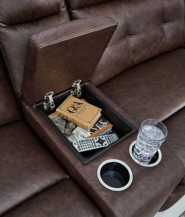  the piece offers relaxation and unparalleled coziness. Its faux leather upholstery is comfortably practical and beautifully enhanced with stylish