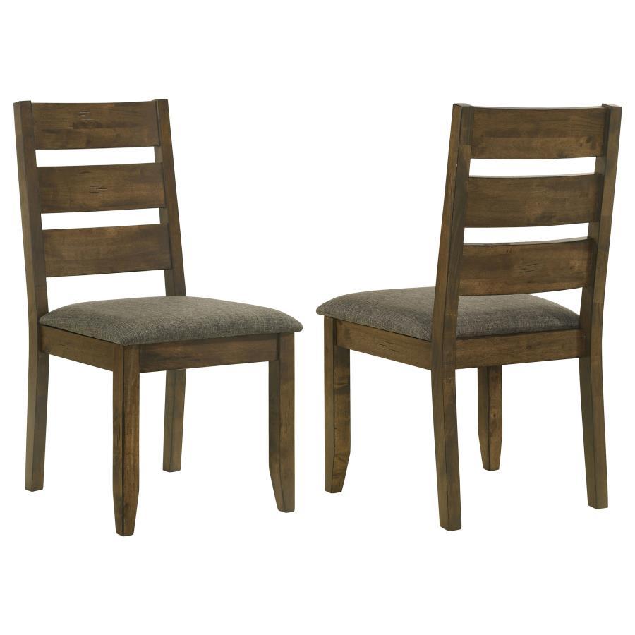With classic glamour and contemporary comfort, this dining chair is an attractive upgrade to an eat-in kitchen or dining room. Crafted from hardwood with knots and organic wood grain, its modern silhouette has a delightful twist of rustic charm. Its back 