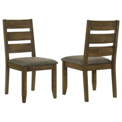 With classic glamour and contemporary comfort, this dining chair is an attractive upgrade to an eat-in kitchen or dining room. Crafted from hardwood with knots and organic wood grain, its modern silhouette has a delightful twist of rustic charm. Its back 