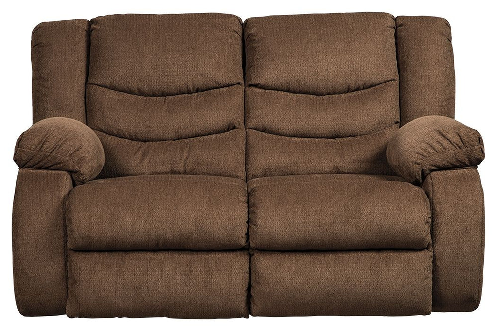 This reclining loveseat puts the win in winning. Its waterfall back design and doubly plump pillowtop arms team up with soft chenille fabric to go for the goal. Ample seating room makes the comfort possibilities endless. Sit back and relax. You wonâ€™t go