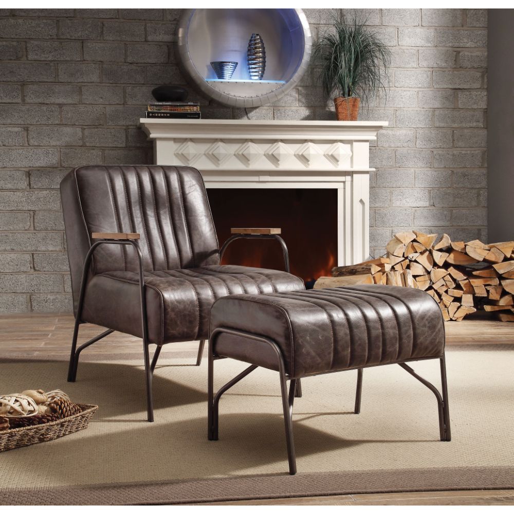 The Sarahi accent chair with ottoman sets you up for a relaxing evening. Constructed with full foam cushions upholstered in top grain leather in a distressed espresso finish, the Sarahi is supported by airy metal curved armrests and legs. Vertical stitchi