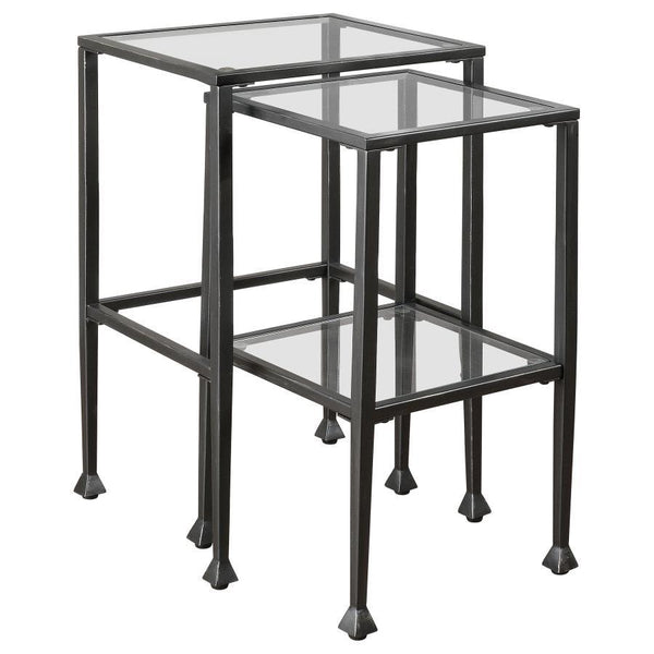 This two-piece nesting table set features sleek, modern design with clear tempered glass tops and shelves. The black powder-coated metal frame ensures durability and stability while enhancing the contemporary look of your living space. Perfect for compact