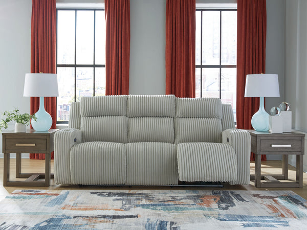  meet irresistible modern function. Your living room gets a cozy-cool upgrade with this power reclining sofa. Curl up in its ultra-chic corded upholstery and recline with one-touch controls. Is it movie night or game time? With ambient L