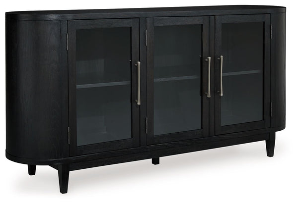 Inspired by art deco design, this dining server makes a lasting impression in a simply stunning way. Its magnificent rounded silhouette is enhanced with a rich layered black finish on the textured wood grain surface. Complete with glass cabinet doors, int