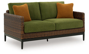 This outdoor loveseat recalls the aesthetics of nature to bring an inviting