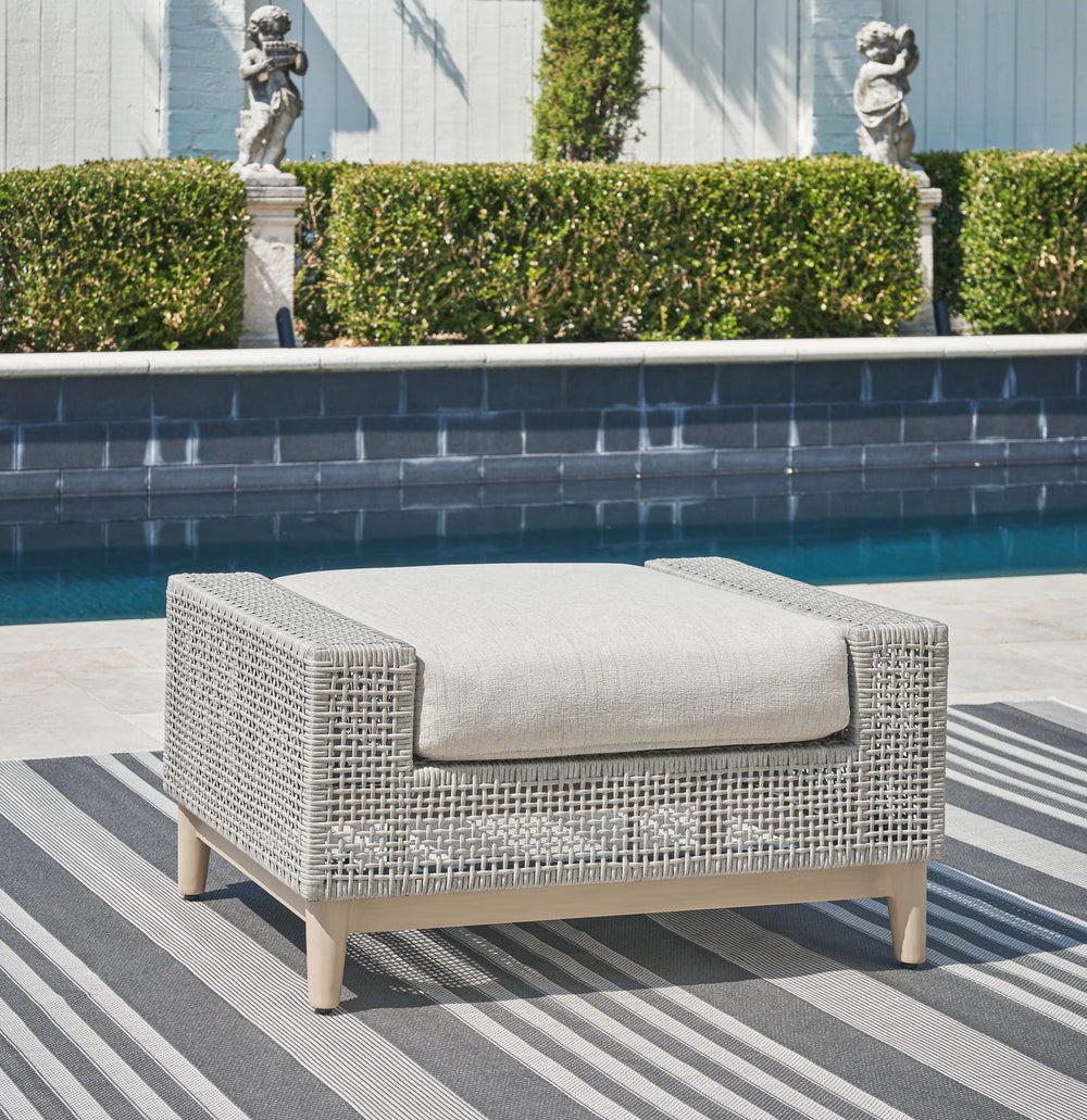 This ottoman invites your casual contemporary style outdoors. With its resin wicker in a chic neutral hue, it expertly marries refined design with durability. Breezy summer mornings and cold winter nights are made all the more comfortable with high-perfor