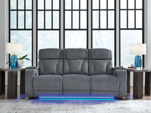  while the extended ottoman takes your comfort to the next level. A drop-down table is decked out 