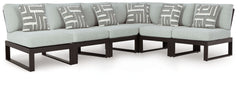 Sleek, contemporary style meets outdoor living in this sectional. Its clean-lined black aluminum frame and resin wicker back expertly balance good looks and longevity. The enhanced UV resistance of Nuvella+â„¢ fabric keeps the cushions light and bright, w