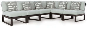 Sleek, contemporary style meets outdoor living in this sectional. Its clean-lined black aluminum frame and resin wicker back expertly balance good looks and longevity. The enhanced UV resistance of Nuvella+â„¢ fabric keeps the cushions light and bright, w