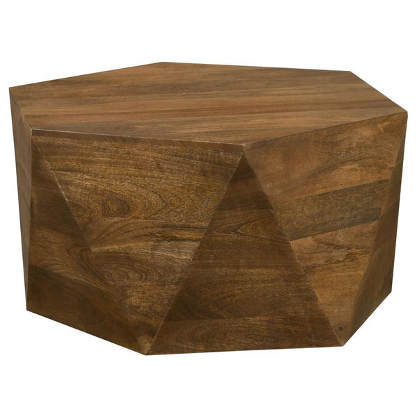 This striking, modern coffee table makes a charming addition to a boho-inspired home or modern farmhouse living room. Designed as a hexagonal shape, this mango wood coffee table offers triangular facets all around the sides for striking visual interest. T