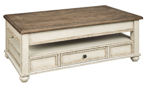 This lift top coffee table is traditional cottage styling taken to a new level. Antiqued two-tone finish blends a chipped white with a distressed wood finished top for a double serving of charm. Crafted with quality dovetail construction, this coffee tabl