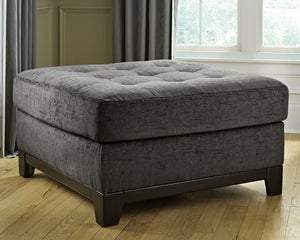  this oversized ottoman takes center stage when it comes to comfort and contemporary style. Exposed feet with a faux wood finish complete the look.<br><br><b>Additional