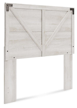 Give provincial a new meaning with the chic look of this full panel headboard. The white wash distressed finish keeps this piece light and fresh while the warm pewter-tone hardware adds an industrial touch. The panel headboard with crossbuck detail adds a