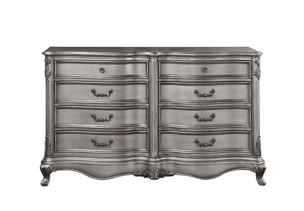  featuring intricate carvings that embody the period. The wingback headboard is a classic design is accented with crystal-l