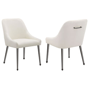 Cradle yourself in the embrace of opulence with this Italian style modern dining side chair, where comfort meets sophistication. Its plated metal legs, tapering into geometric spheres, create a foundation that-'s as sturdy as it is striking. The seat, a h