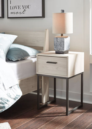  this nightstand is inspired by chic design. A light natural finish over replicated oak grain offers an authentic touch to this so-cool piece. It beautifully blends the hues of natural living with the edginess of your modern lifestyle.<br