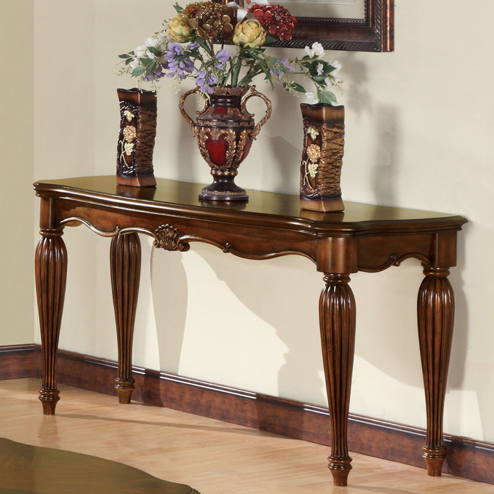 This Dreena occasional table will give your living room a stylish update. Decorative carving accents carved apron with accent details along its turned fluted legs to further intensify the traditional design and graceful sophistication.<br/><br/><b>Product