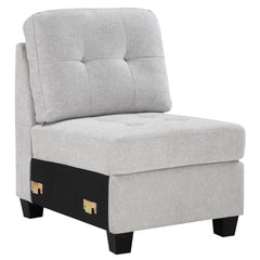 Build the sectional that suits your space with a modern armless chair. In soft beige upholstery, it-'s the perfect way to extend your Georgina collection sectional sofa, adding length to suit your living room. The chair features tufted cushions and sinuou