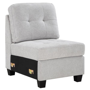 Build the sectional that suits your space with a modern armless chair. In soft beige upholstery, it-'s the perfect way to extend your Georgina collection sectional sofa, adding length to suit your living room. The chair features tufted cushions and sinuou