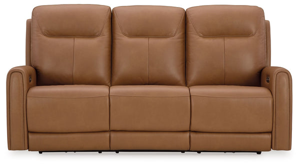 Reserved for him and made for her. This power reclining sofa delivers all the comfort and style you could ask for. Inspired by sports car interiors, the expertly matched leather and faux leather upholstery features jumbo stitching for even more appeal. An