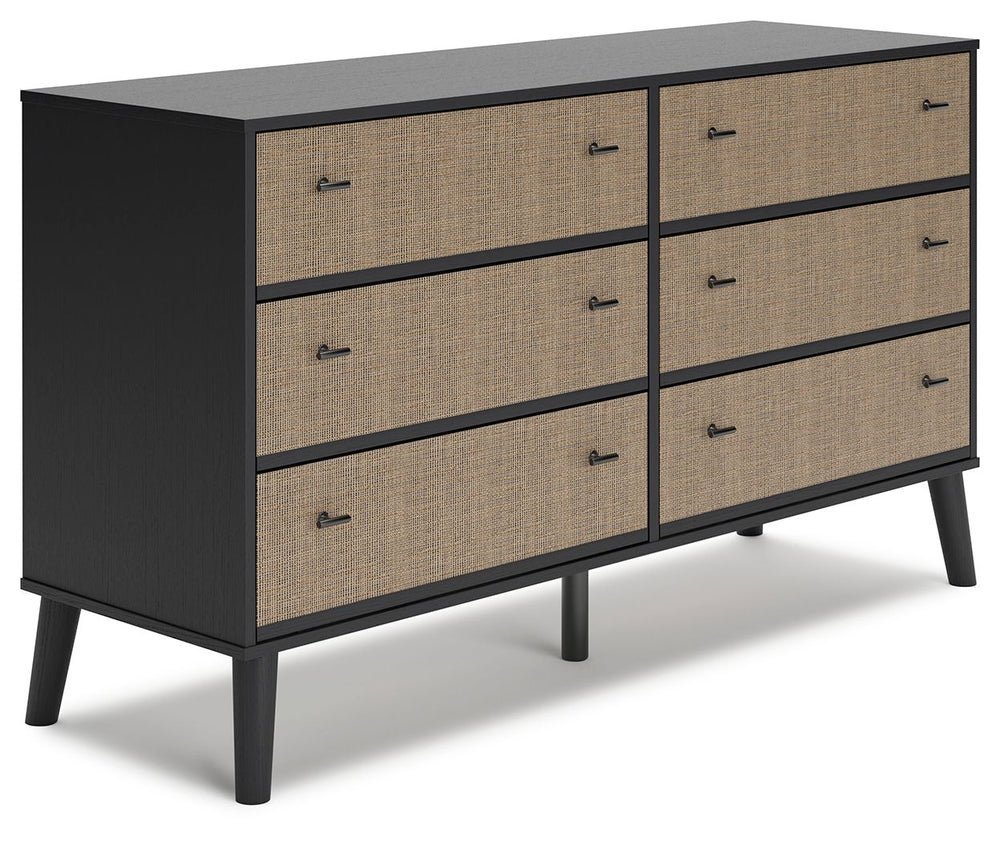Put a retro spin on current trends with this dresser. Its mixed-material look of matte black and replicated beige cane brings a casually cool feel to your bedroom. Simple, sleek hardware and splay legs round out the urban meets mid-century vibe.<br><br><b
