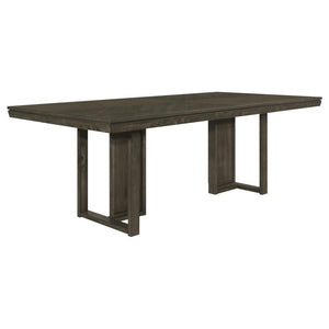 Take your dining experience to new heights with our chic transitional table. The sleek dark grey finish, adorned with a subtle chevron pattern, adds a touch of elegance to any space. The table-'s simple trestle base design brings a modern touch, completin