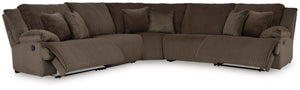 Experience unparalleled comfort with this reclining sectional. Itâ€™s a stylish and invitingly soft lookâ€”made all the more appealing by cozy corduroy cushions that feel great and add a touch of texture. The rich chocolate brown upholstery effortlessly b