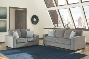 Everyone can have the best seat in the house with this sofa and loveseat. An indulgent choice with deep seats crafted for cloud-like softness, this set is the ideal merger of modern flair and classic staying power. <h4><b>Altari - Alloy - Sofa</b></h4> <t
