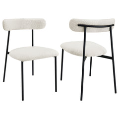 Upgrade your kitchen or dining room seating experience with a set of two modern side chairs. Each boasts a slim framework crafted in durable metal. A black finish creates depth and contrast, offering the perfect complement to soft white boucle upholstery.