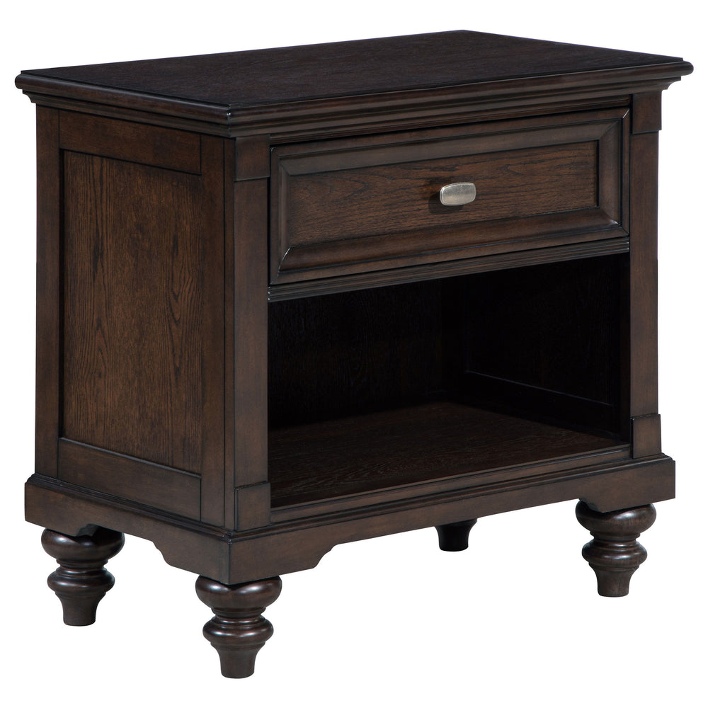 This nightstand combines classic design with modern functionality, making it a perfect addition to any traditional bedroom. The dark oak finish enhances the intricate wood grain, while the single drawer offers convenient storage for bedside essentials. An