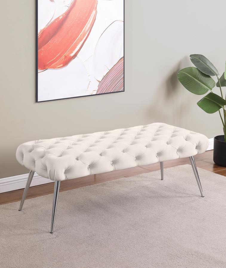 Enhance your living area, bedroom, or entryway with this sophisticated bench, skillfully blending timeless tufting and plush upholstery for a luxurious look and feel. Its meticulous button-tufted top adds depth and dimension, while slender metal legs prov
